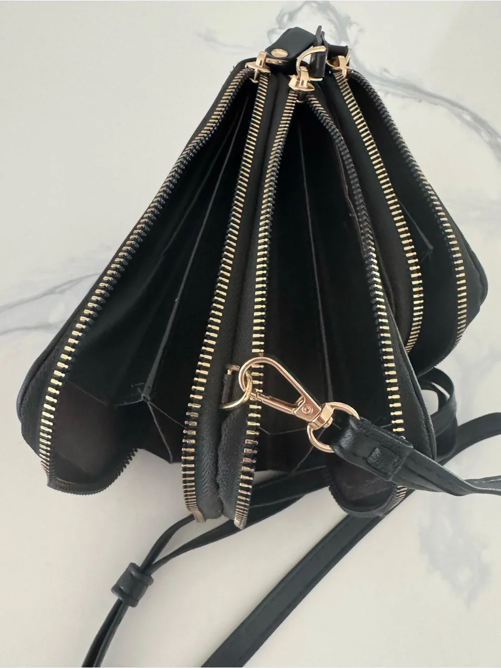 Elegant Black Crossbody Bag with Gold Accents - Minimalist Carry